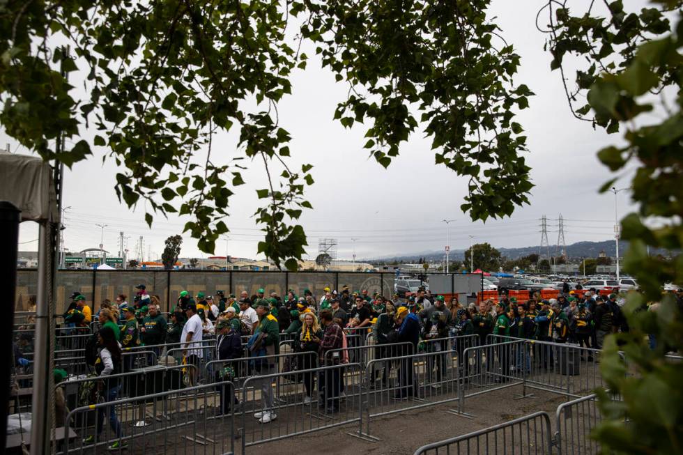 Oakland Athletics fans line up for the opening night game against the Baltimore Orioles on Mond ...