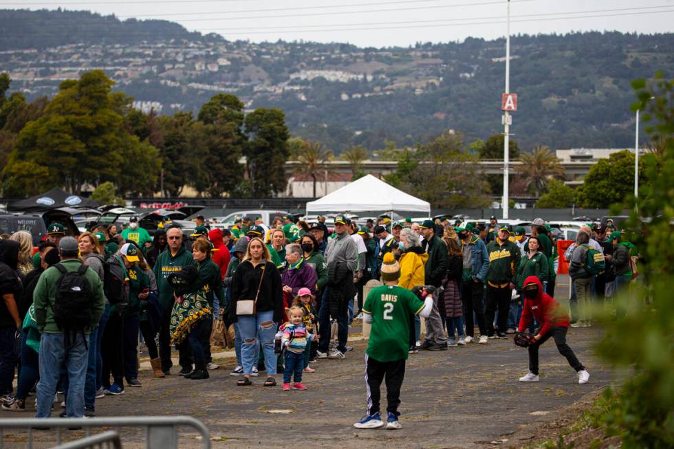 Oakland Athletics fans line up for the opening night game against the Baltimore Orioles on Mond ...