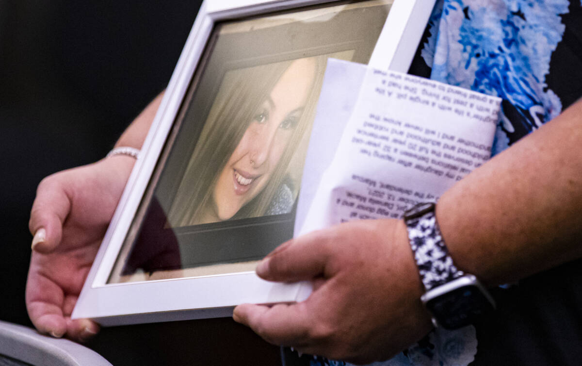 Sabrina Young holds a picture of her daughter Daniella Young, who was 13 when she died from an ...