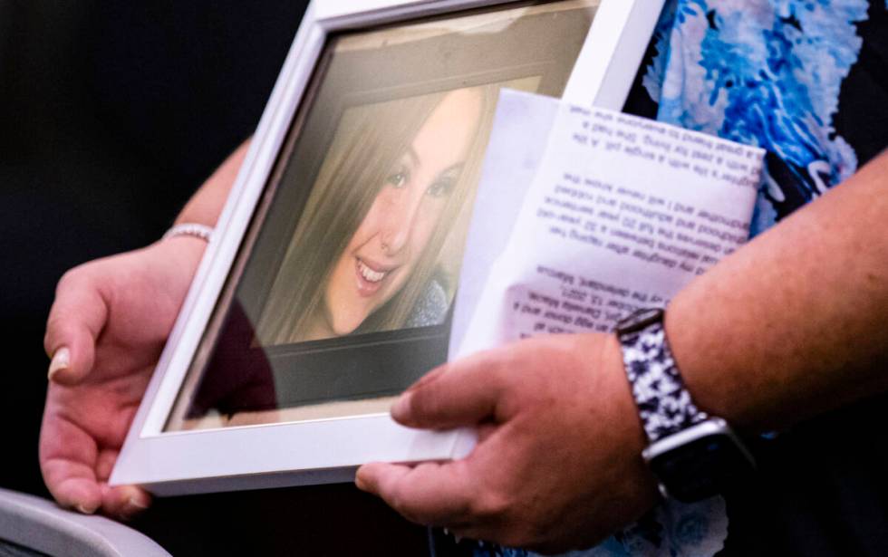 Sabrina Young holds a picture of her daughter Daniella Young, who was 13 when she died from an ...