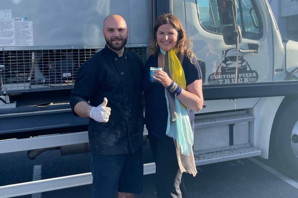 Chef Bart Wawrzyszak of Custom Pizza Truck and Elizabeth Blau take a moment at their fundraiser ...