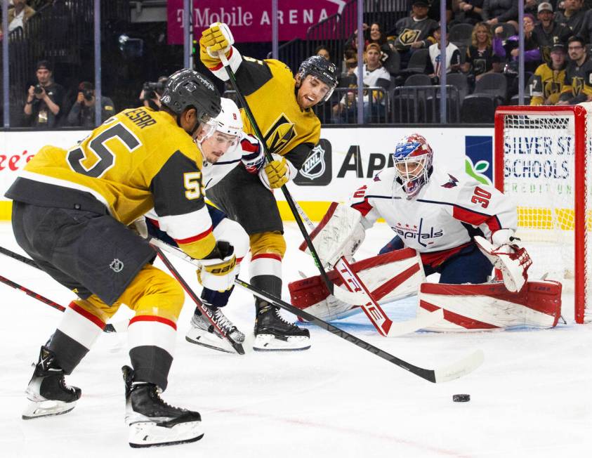 Golden Knights right wing Keegan Kolesar (55) shoots on Washington Capitals goaltender Ilya Sam ...