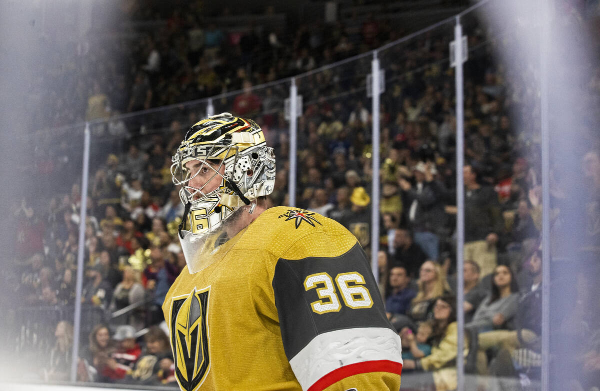 Golden Knights goaltender Logan Thompson (36) circles the ice in overtime during an NHL hockey ...