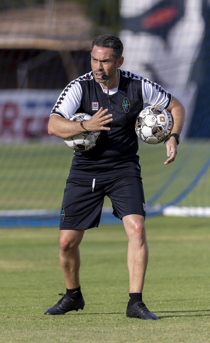 Lights FC head coach Enrique Duran observes his players during practice at Cashman Field on Fri ...