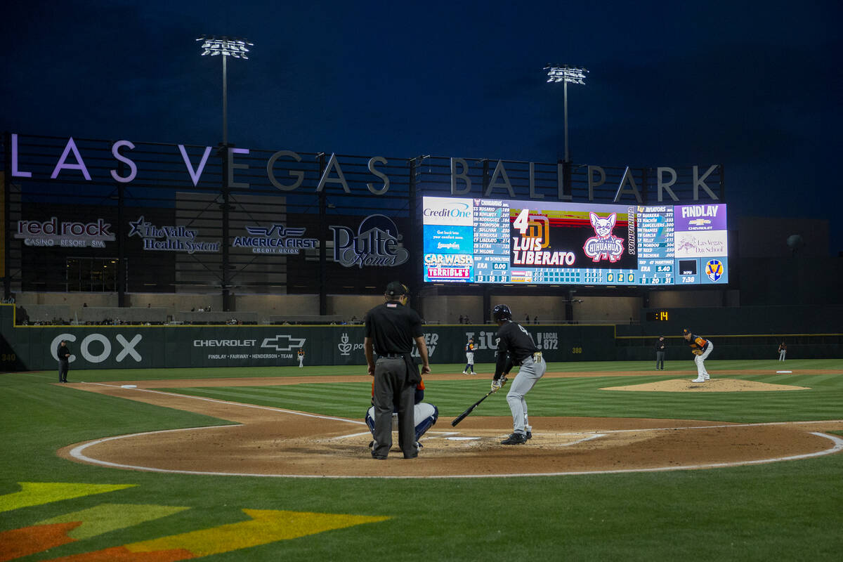 Las Vegas Aviators pitcher Adrian Martinez (47) throws to El Paso Chihuahuas outfielder Luis Li ...