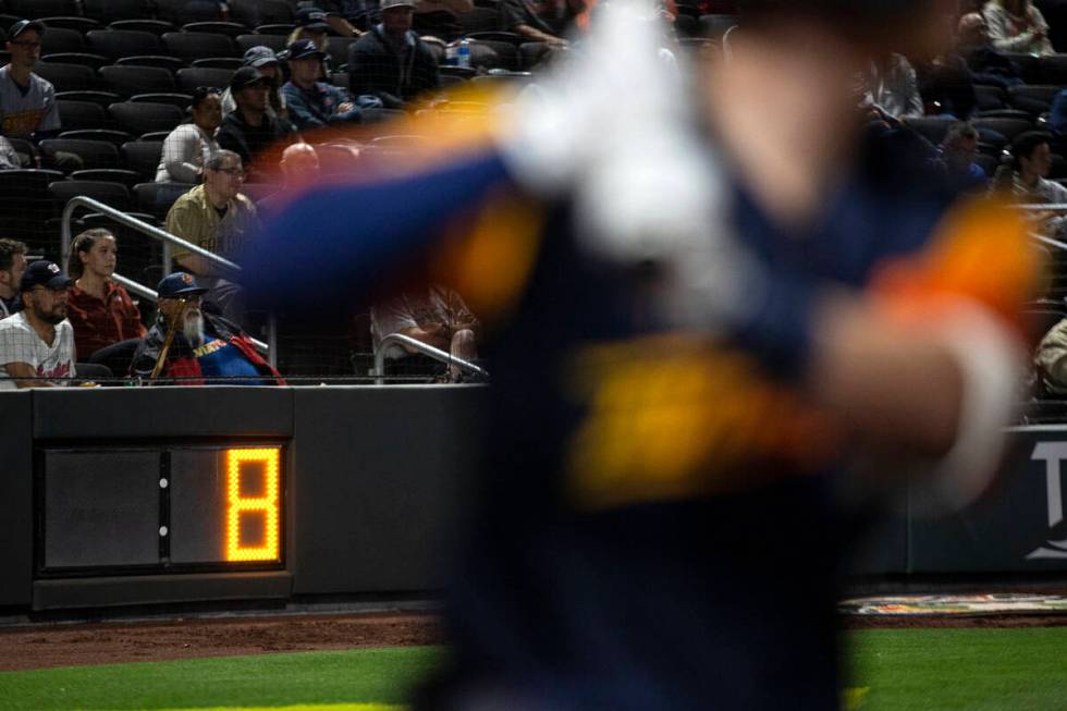 A batter warms up as the pitch clock is at 8 seconds during a Minor League Baseball game betwee ...