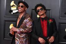 FILE - Anderson .Paak, left, and Bruno Mars, of the duo Silk Sonic, appear at the 63rd annual G ...