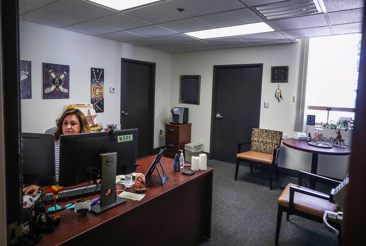 Sylvia Beardsley works in her office that once was an operating room suite at Dignity Health&#x ...