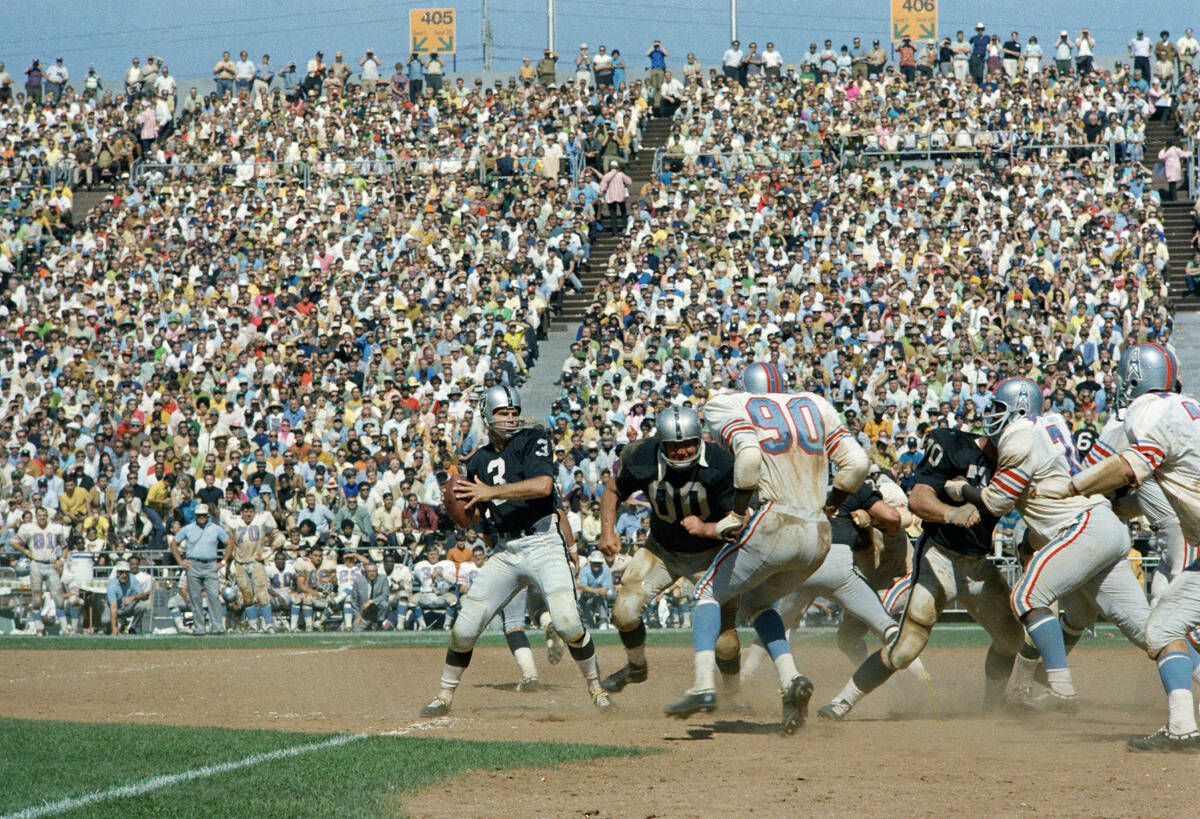 Oakland Raiders quarterback Daryle Lamonica is shown in a game with the Houston Oilers in 1969. ...
