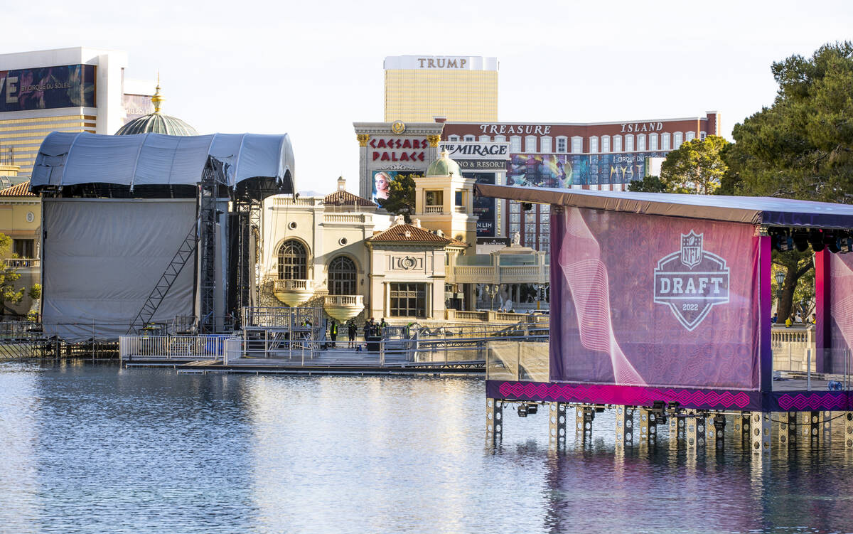 Crews continue with preparations for the NFL Draft 2022 stage at the Bellagio Fountains on Satu ...
