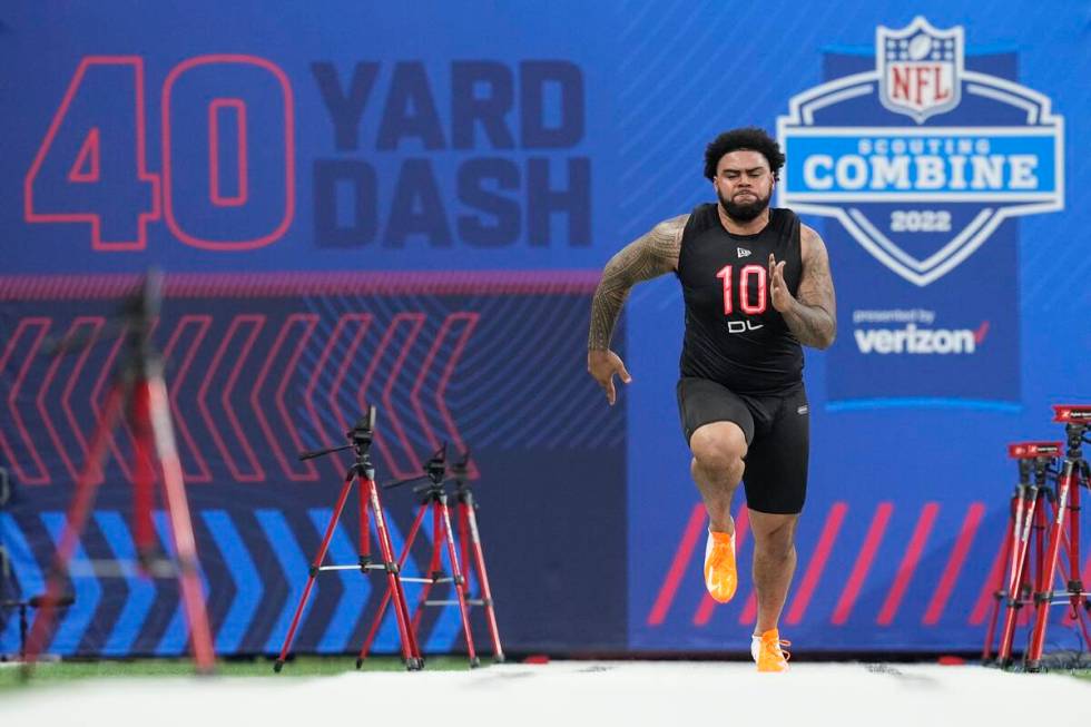 Ohio State defensive lineman Haskell Garrett runs the 40-yard dash during the NFL football scou ...