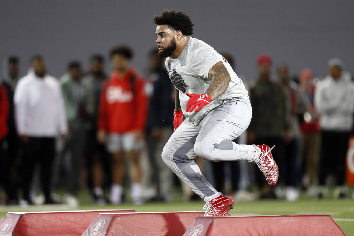 Defensive tackle Haskell Garrett runs a football drill during Ohio State Pro Day in Columbus, O ...