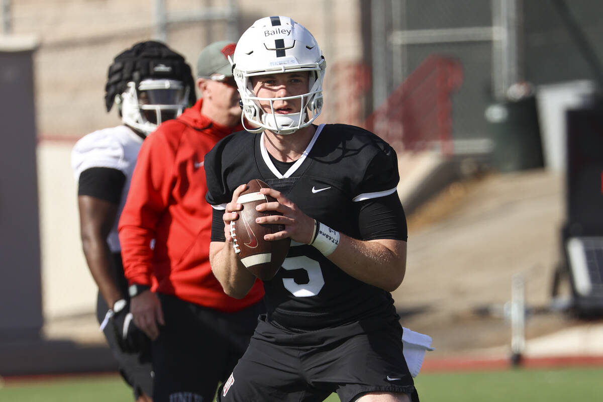UNLV Rebels quarterback Harrison Bailey (5) looks to throw a pass during the first day of sprin ...