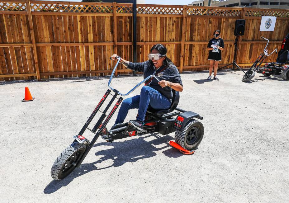 Maria Silva attempts a driving intoxicated simulation at the Community Safety Day event at the ...