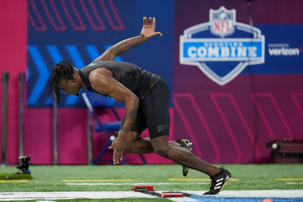 Baylor defensive back Kalon Barnes runs the 40-yard dash at the NFL football scouting combine, ...