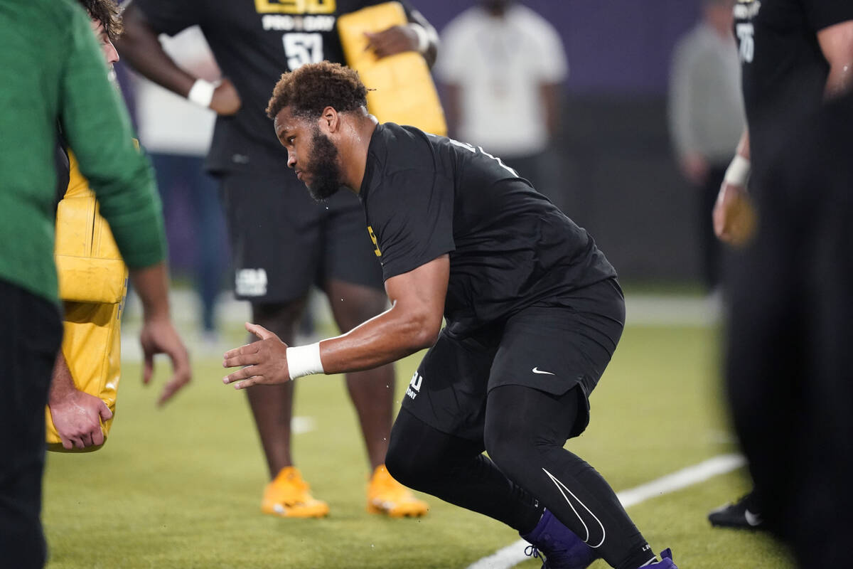 LSU guard Ed Ingram runs through drills during LSU Pro Day in Baton Rouge, La., Wednesday, Apri ...