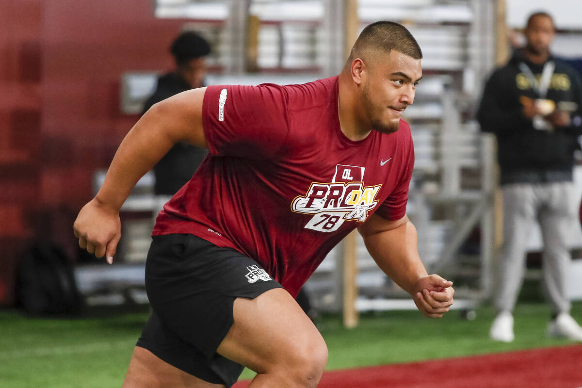 Defensive lineman Daniel Fa'alele runs drills at Minnesota football Pro Day Wednesday, March 16 ...