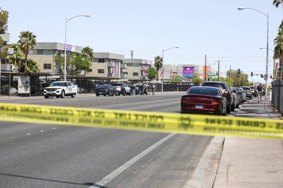 Police at the scene of a fatal shooting in central Las Vegas, Sunday, April 24, 2022. (Rachel A ...