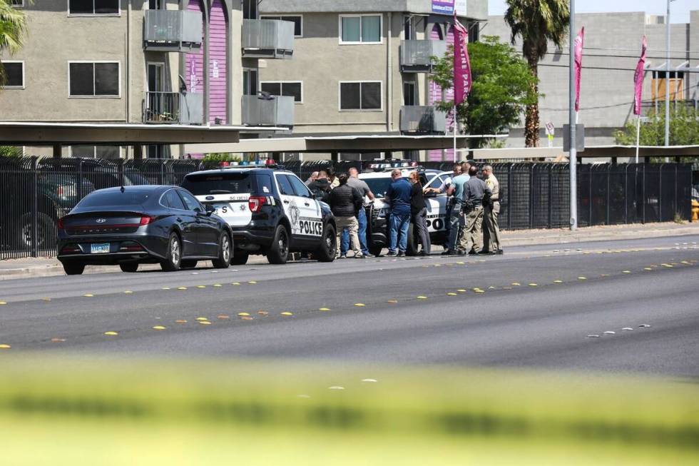 Police at the scene of a fatal shooting in central Las Vegas, Sunday, April 24, 2022. (Rachel A ...