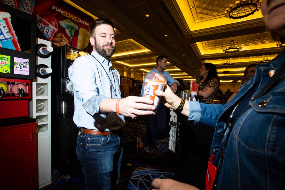 Mike Bailey, director of business development at The Icee Company, hands out an Icee at the Cin ...