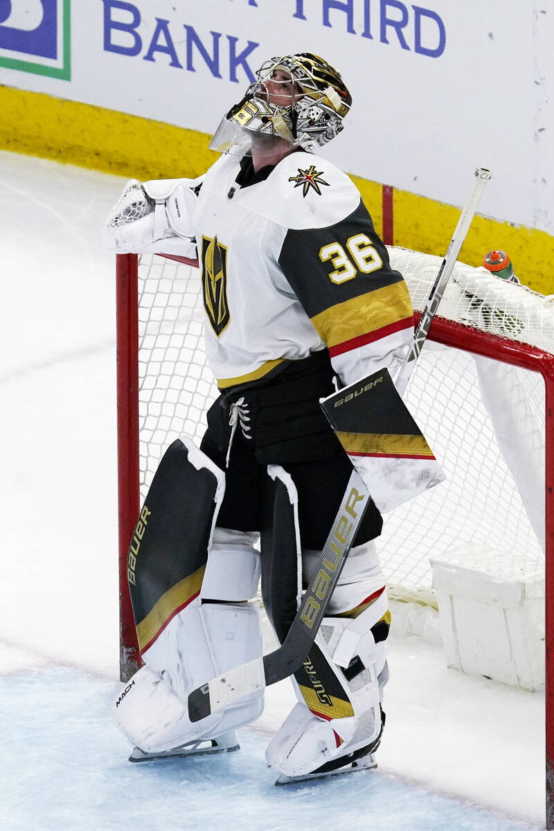 Vegas Golden Knights goaltender Logan Thompson looks up the score board during the second perio ...