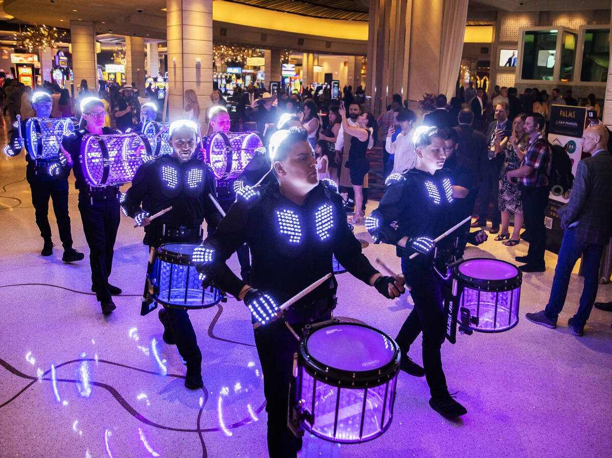 The Vegas Golden Knights Drumbots drumline perform during the reopening party at the Palms on W ...