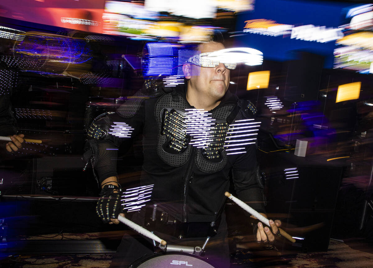 The Vegas Golden Knights Drumbots drumline performs during the reopening party at the Palms on ...