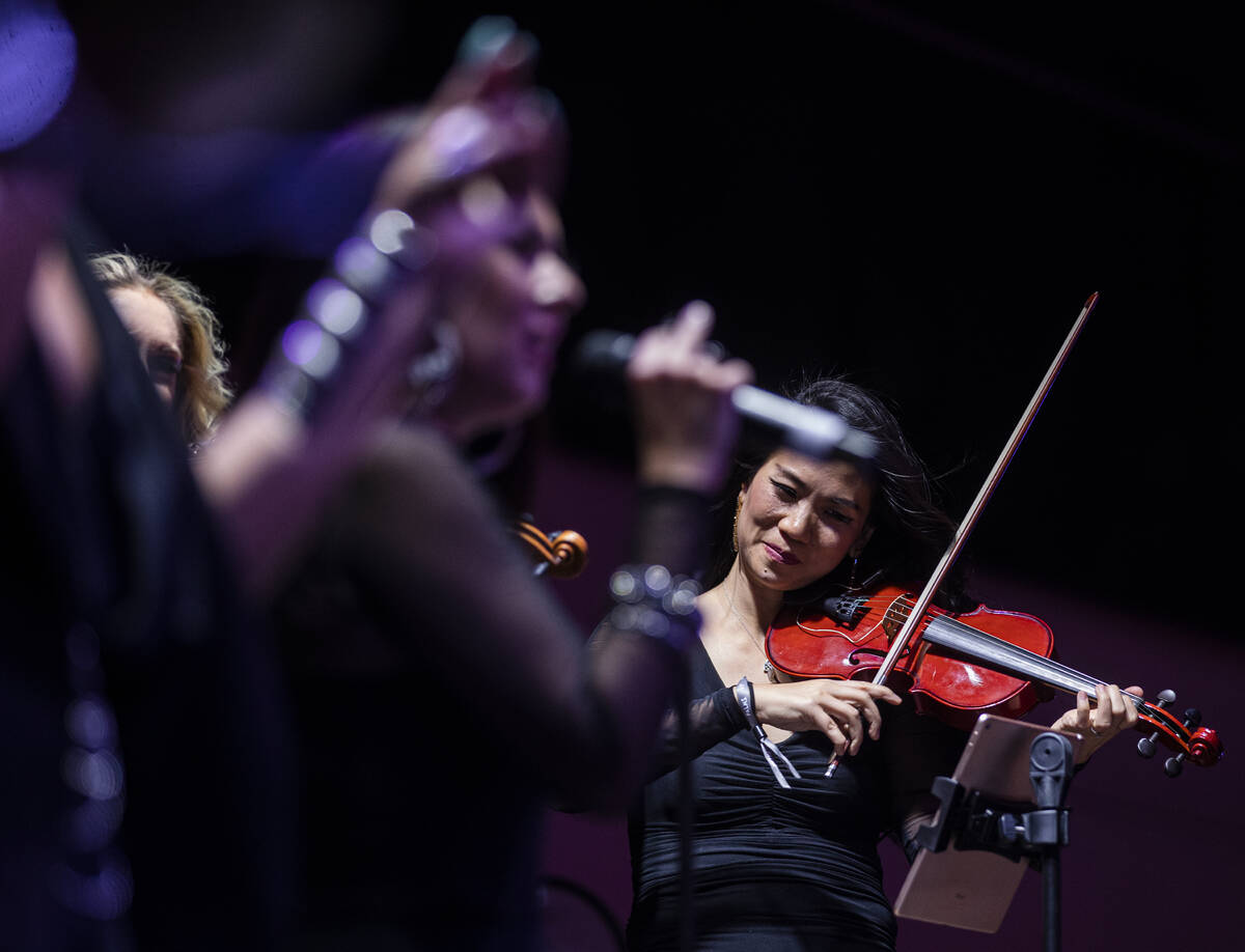 David Perrico Pop Strings Orchestra performs during an opening night party at Kaos at the Palms ...