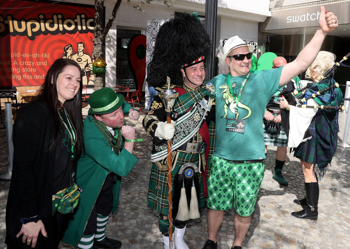 Hannah Ablett of Grand Rapids, Mich., from left, Joey “Joey the Leprechaun” Minni ...