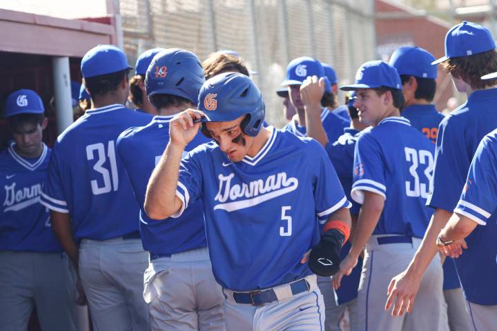 Bishop Gorman's Demitri Diamant (5) and his teammates celebrate during a baseball game at Cimar ...