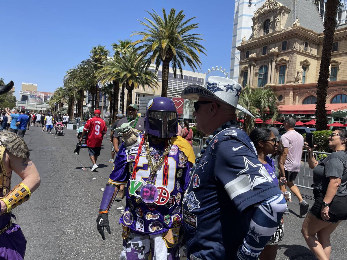 Chris Contreras, left, is better known by Minnesota Vikings' faithful by his moniker Mando Vik ...