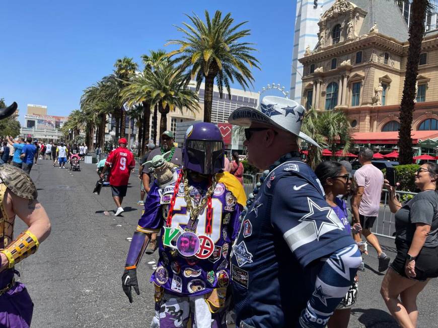 Chris Contreras, left, is better known by Minnesota Vikings' faithful by his moniker Mando Vik ...