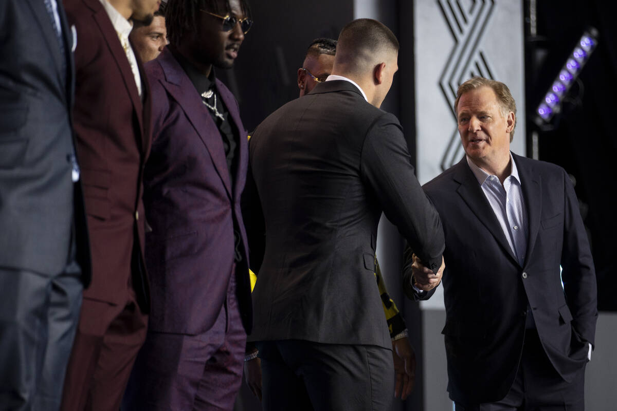 Commissioner Roger Goodell greets draft prospects during the NFL Draft event in Las Vegas, Thur ...
