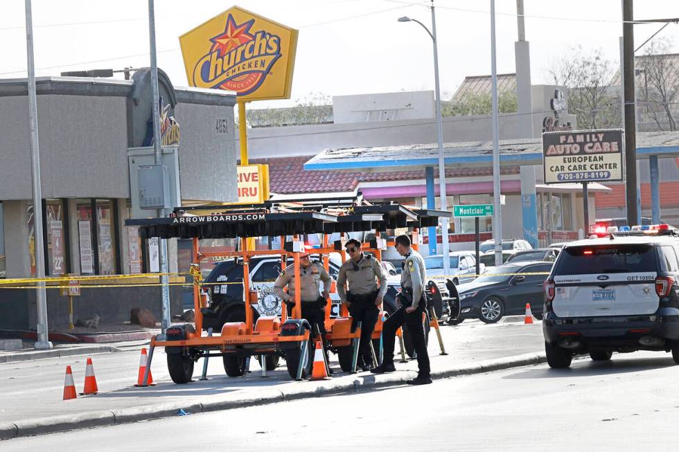 Las Vegas police investigate a shooting near the intersection of Decatur and Charleston bouleva ...