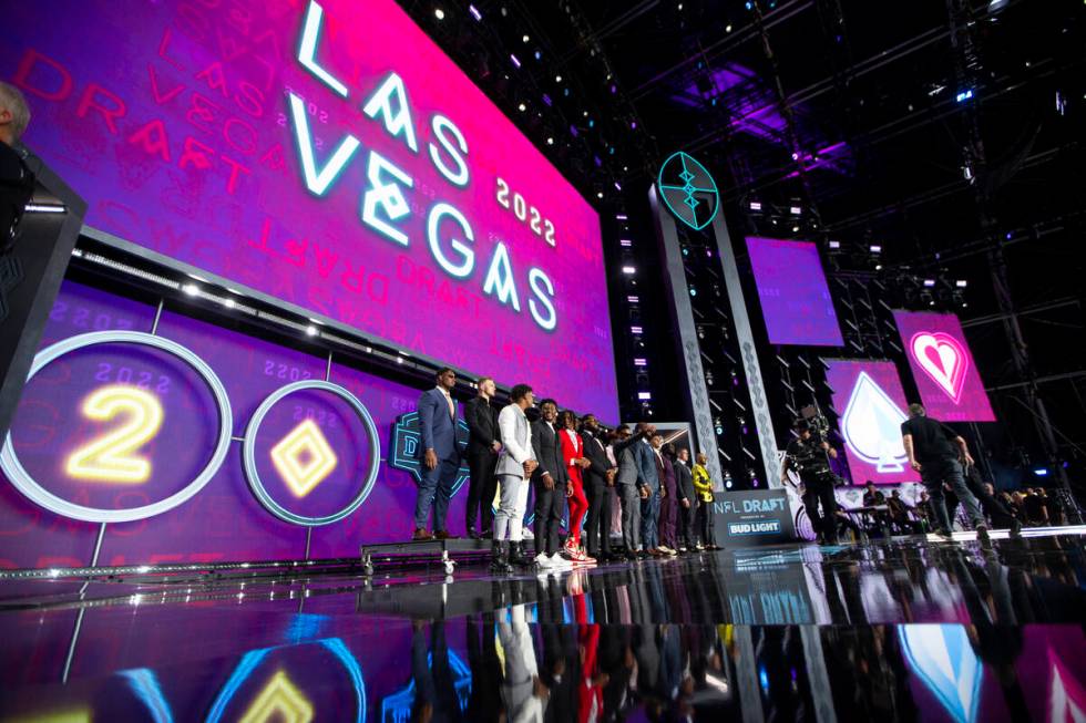 Draft prospects take the stage during the NFL Draft event in Las Vegas, Thursday, April 28, 202 ...