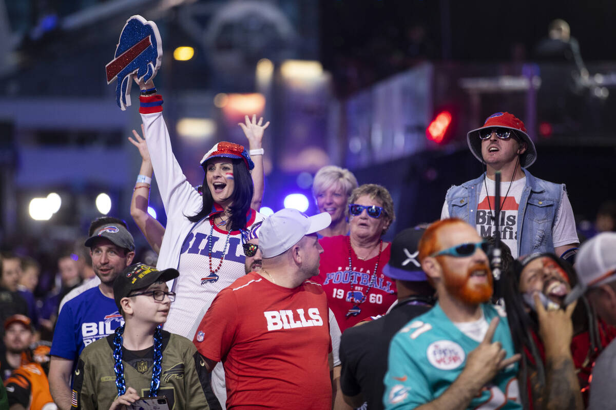 Fans cheer during the round one of the NFL Draft event in Las Vegas, Thursday, April 28, 2022. ...