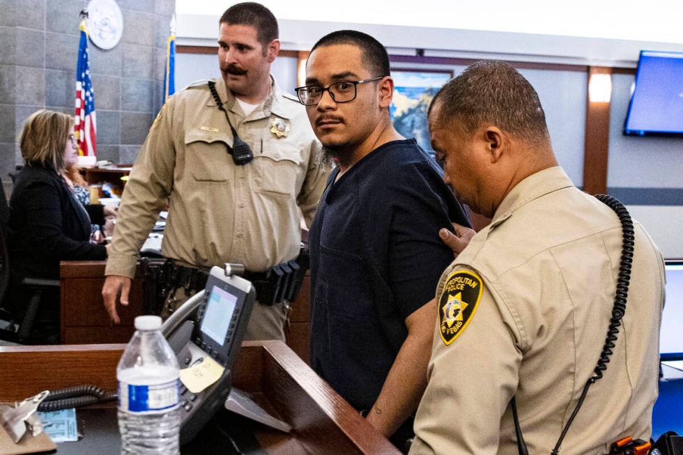 Edgar Samaniego, 21, who pleaded guilty to shooting Metro officer Shay Mikalonis, led out of th ...