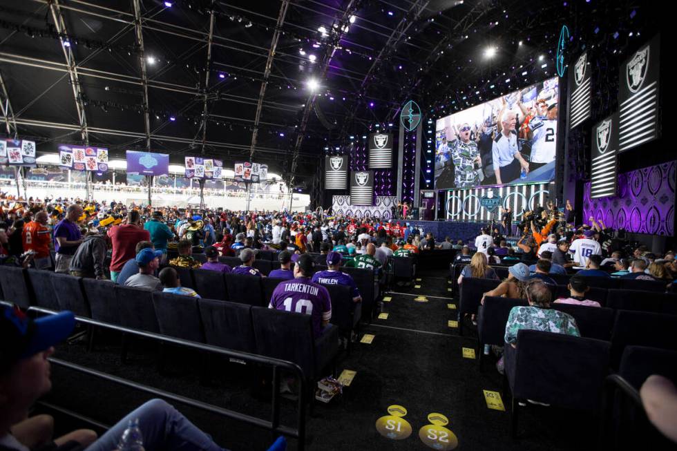 Fans attend the second day of the NFL Draft event in Las Vegas, Friday, April 29, 2022. (Erik V ...