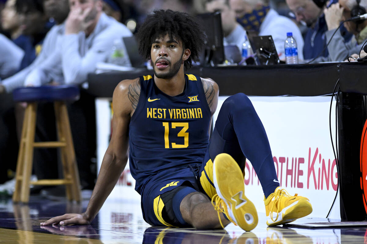 West Virginia forward Isaiah Cottrell waits to enter the game against Kansas State during the s ...
