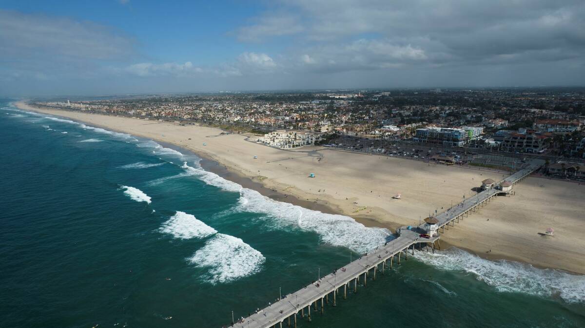 The pier and shoreline is seen in Huntington Beach, Calif., in October 2021. (AP Photo/Ringo H. ...