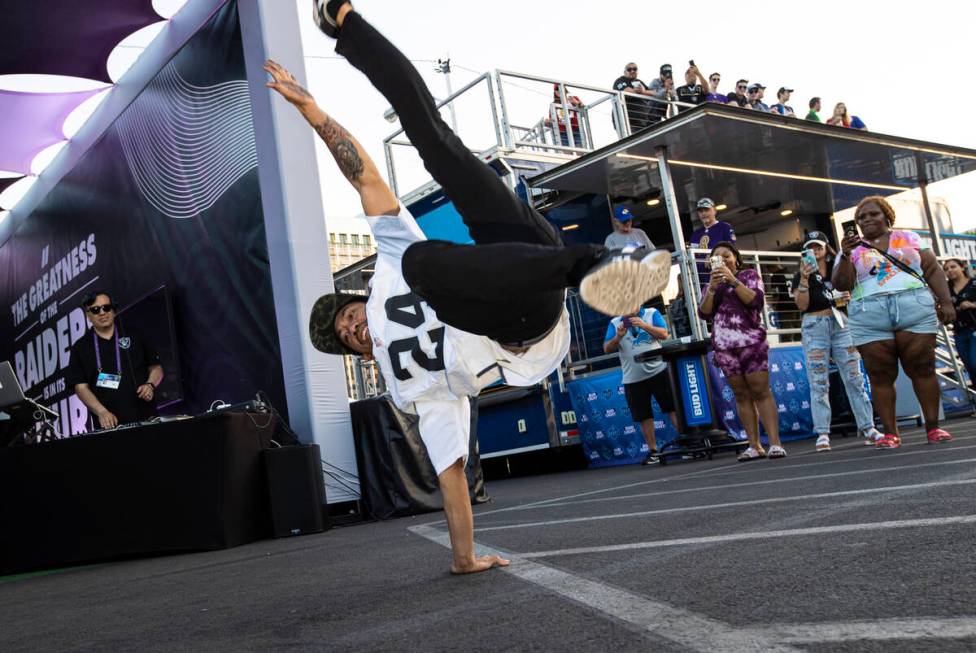 Aries Bungcayao, of Las Vegas, dances during the second day of the NFL draft on Friday, April 2 ...