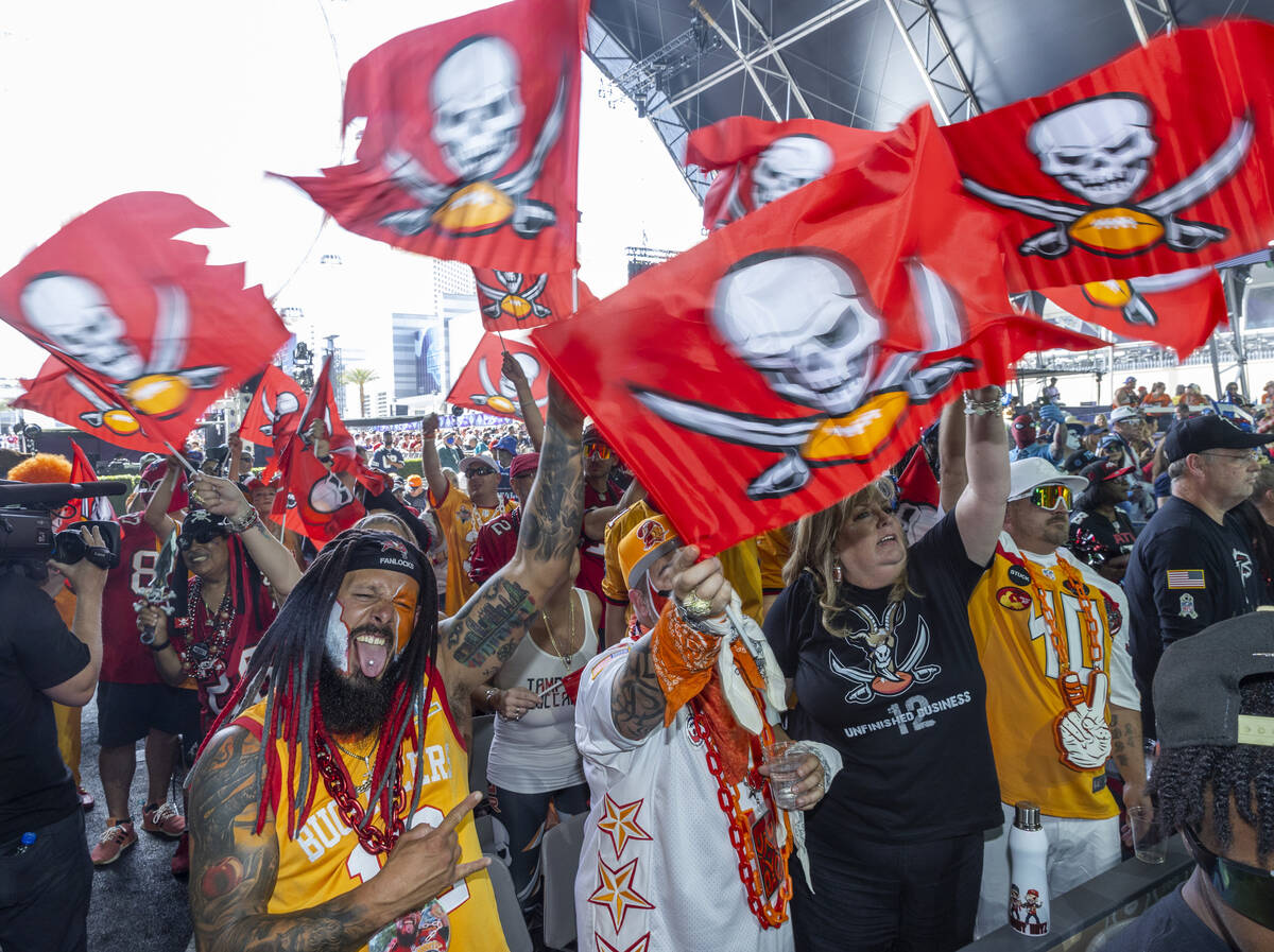 Tampa Bay Buccaneers fans cheer at the Draft Theater during the second day selections for the 2 ...