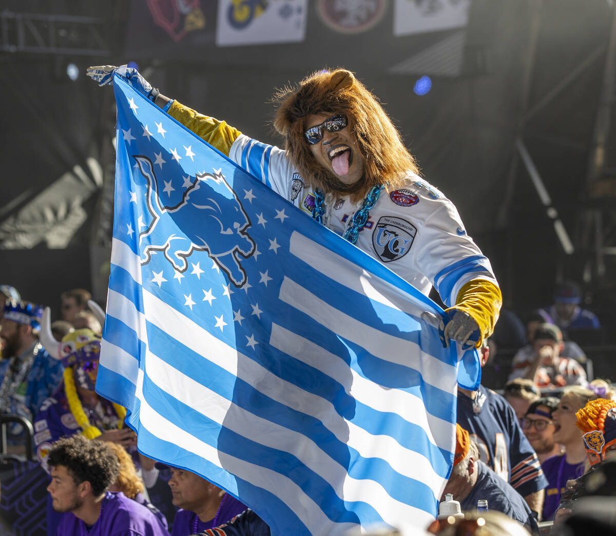 A Detroit Lions fan has fun at the Draft Theater during the second day selections for the 2022 ...