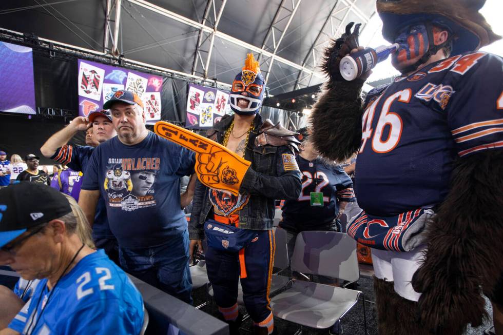 Fans get ready for the start of the second day of the NFL Draft event in Las Vegas, Friday, Apr ...