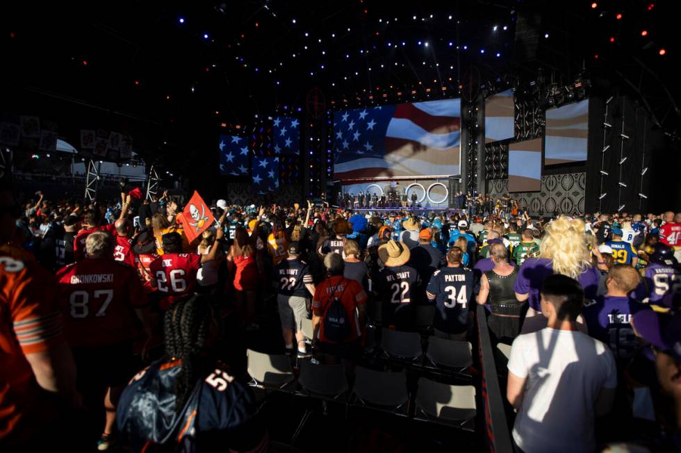 Fans attend the second day of the NFL Draft event in Las Vegas, Friday, April 29, 2022. (Erik V ...