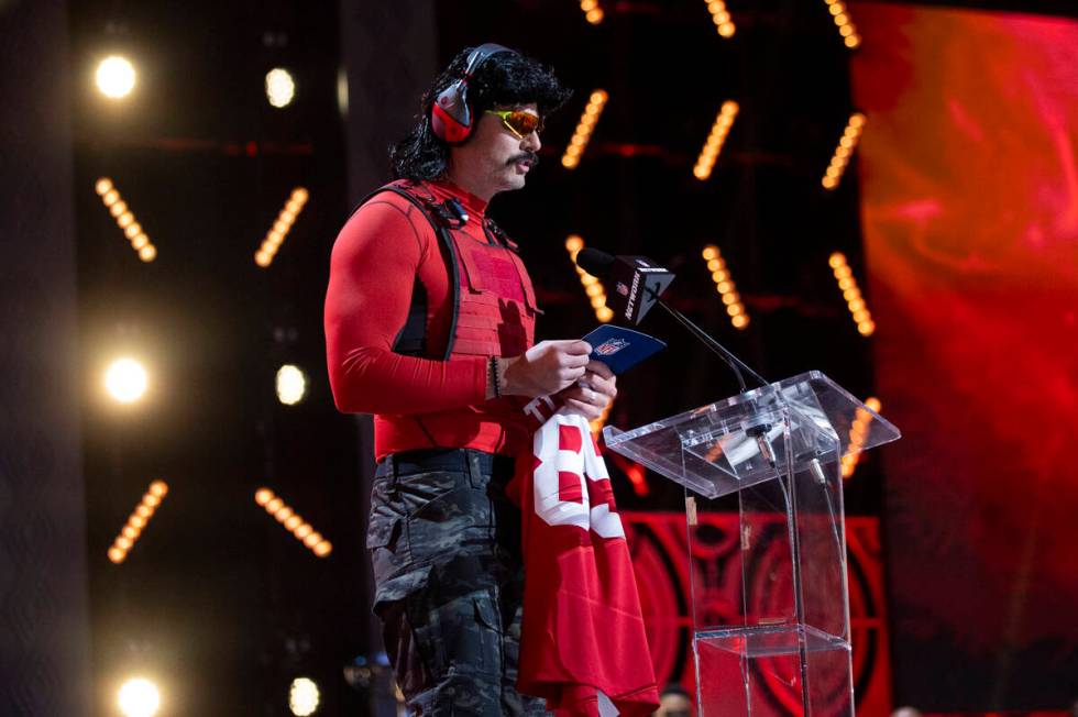Dr. Disrespect announces a draft pick selection by the San Francisco 49ers during the second da ...