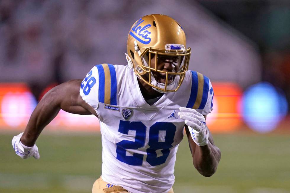 UCLA running back Brittain Brown (28) runs down field in the second half during an NCAA college ...