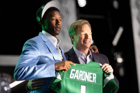 NFL Commissioner Roger Goodell, right, poses with Sauce Gardner, after the New York Jets select ...