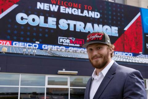 New England Patriots NFL football first-round draft pick offensive linesman Cole Strange walks ...