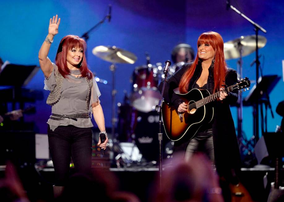 FILE - Naomi Judd, left, and Wynonna Judd, of The Judds, perform at the "Girls' Night Out: ...